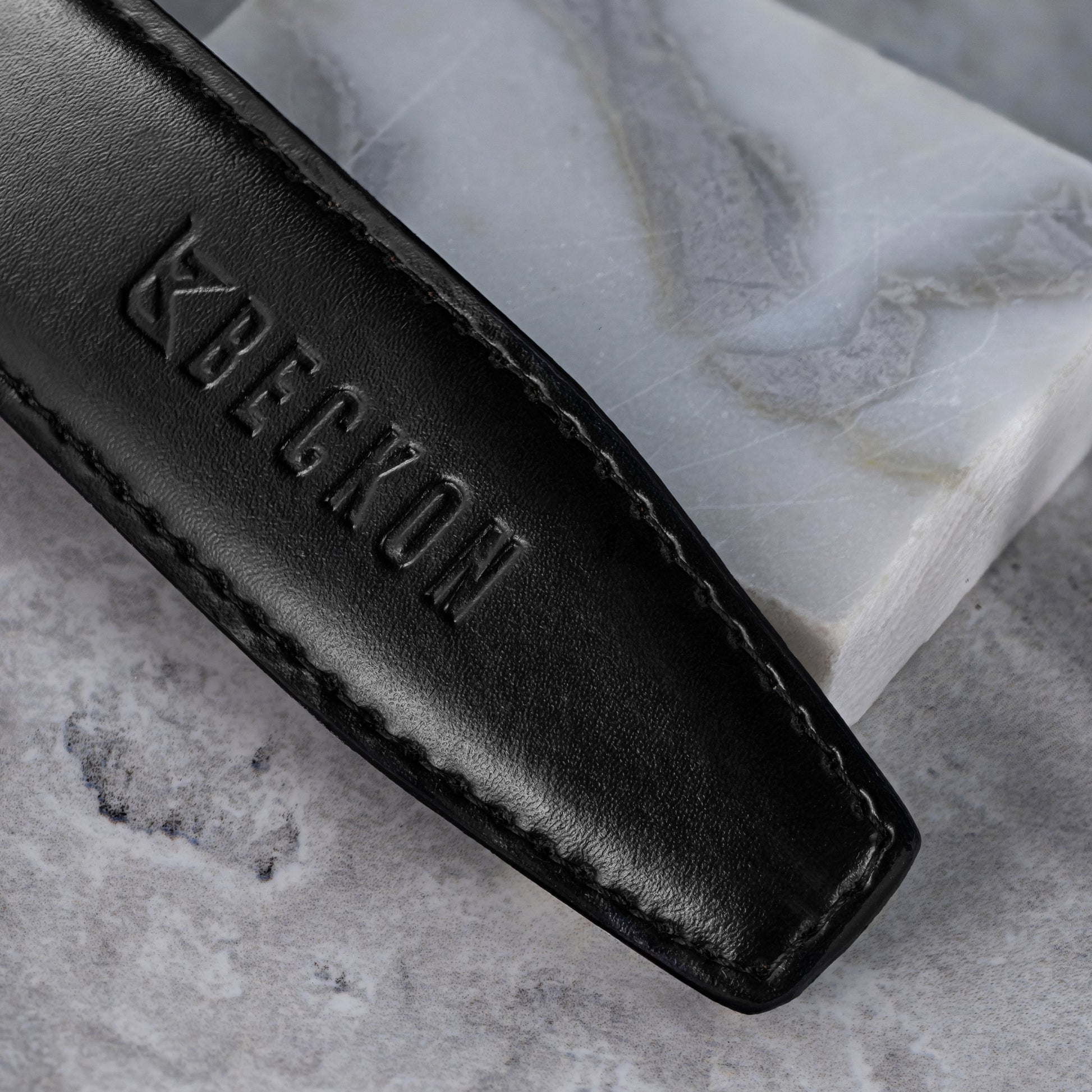 Men's formal and casual reversible leather belt with black and dark espresso leather strap.