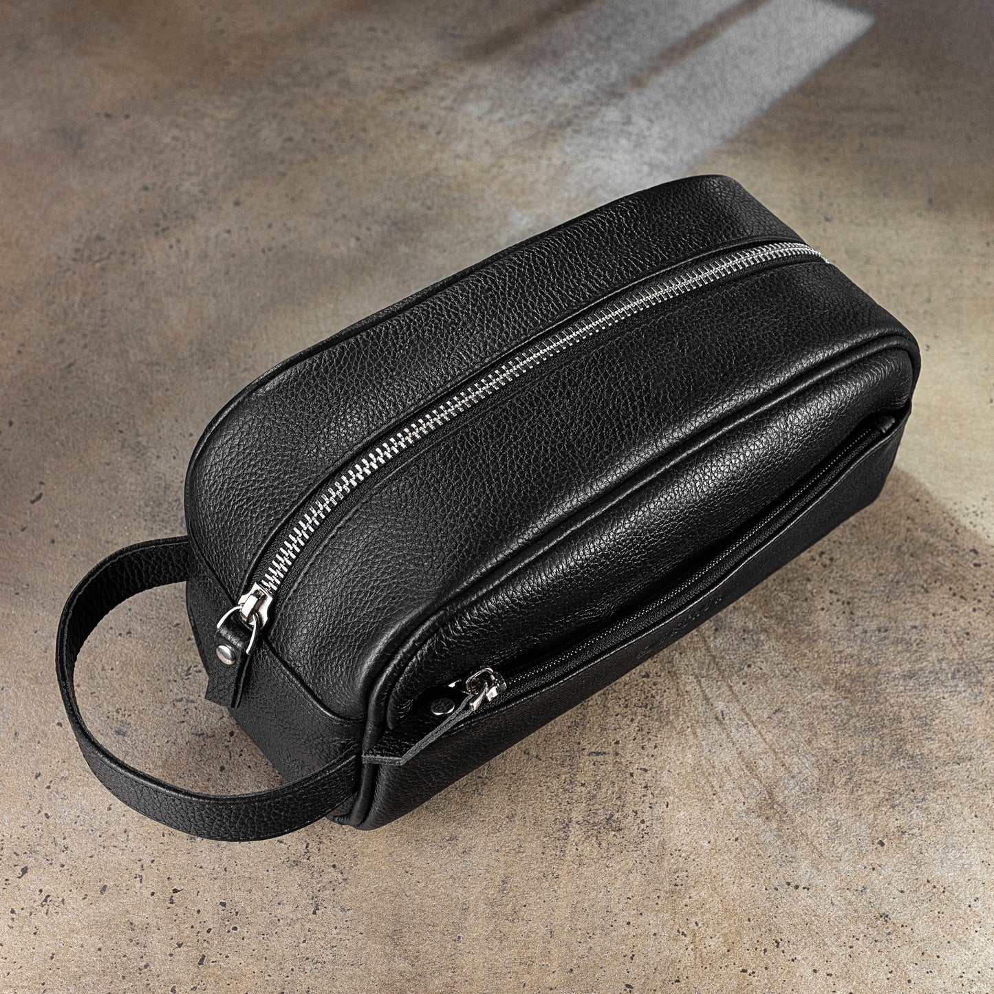 Black leather toiletry bag travel dopp kit